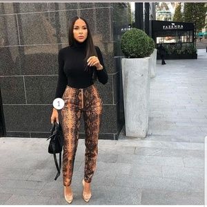 Snake coated trousers